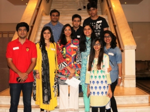 Saad Malik (front row, left, in red) joins fellow Competitive College Club members in Lahore.