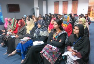 Women listen intently during a GRE orientation session at Islamic International University, Islamabad.