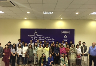 Alumni in Lahore enjoy the screening of "Armed with Faith".